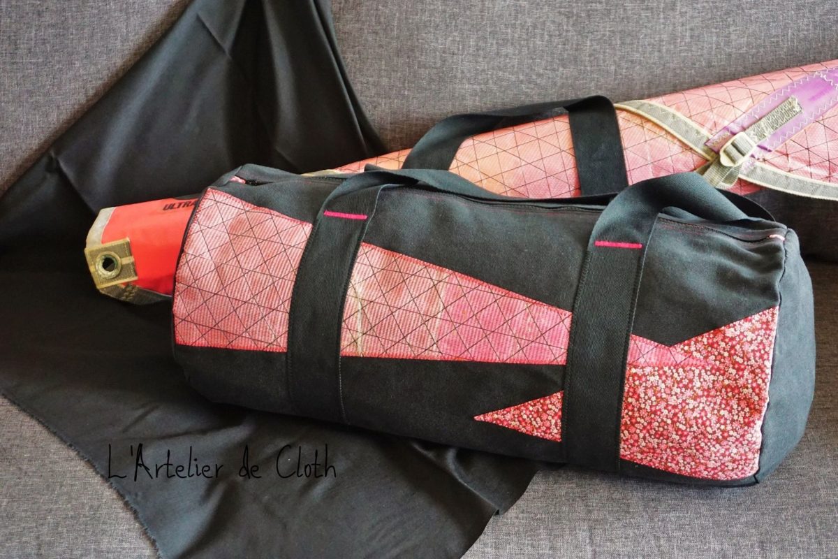 Créations pour femmes : sac cabine noir et voile de planche rose